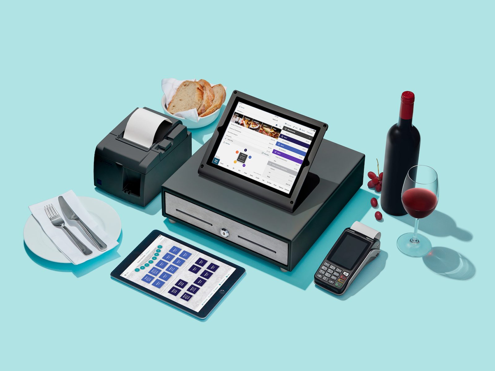 TouchBistro point-of-sale system on a teal set